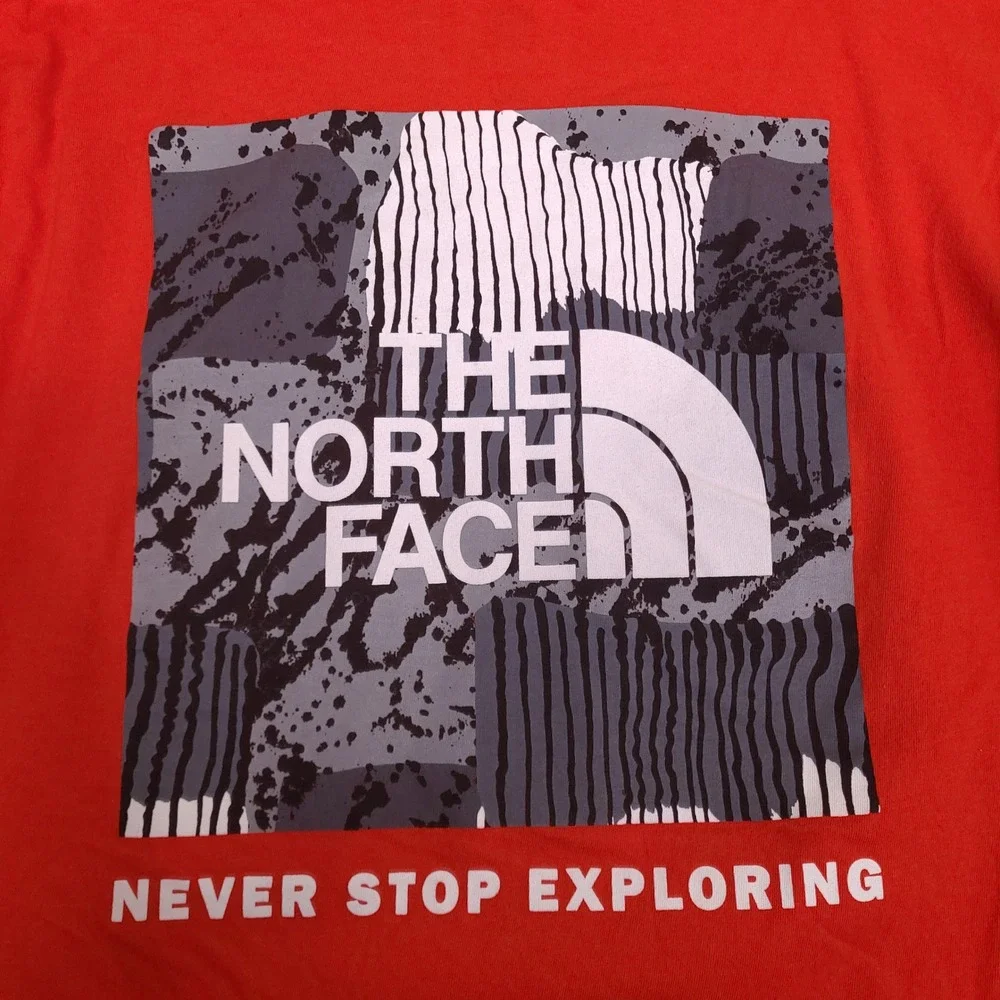 The North Face T-Shirt Mens Small Orange Circular Design Long Sleeve Graphic‎